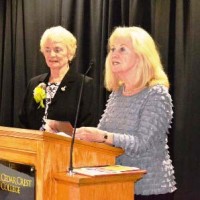 Nancy King receiving CARE Celebrate Literacy Award