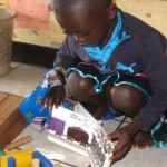 Children often match book themes to what they build, write, and draw. This girl made a train with colorful blocks, almost like the one in Freight Train. Integrated learning is prized in TEACH Rwanda schools.