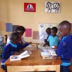 At Judith’s Reading Room Muhanga, children spread their books on the table. “Teacher, look what I found!” “Look! Look!” They are SO excited!
