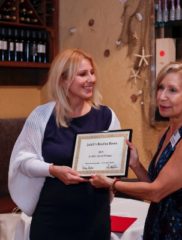 Linda preseting Judith’s Award to Vicky Xanthopoulou
