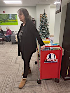Marlene Arnholt with JRR Book Cart that was originally donated in 2012